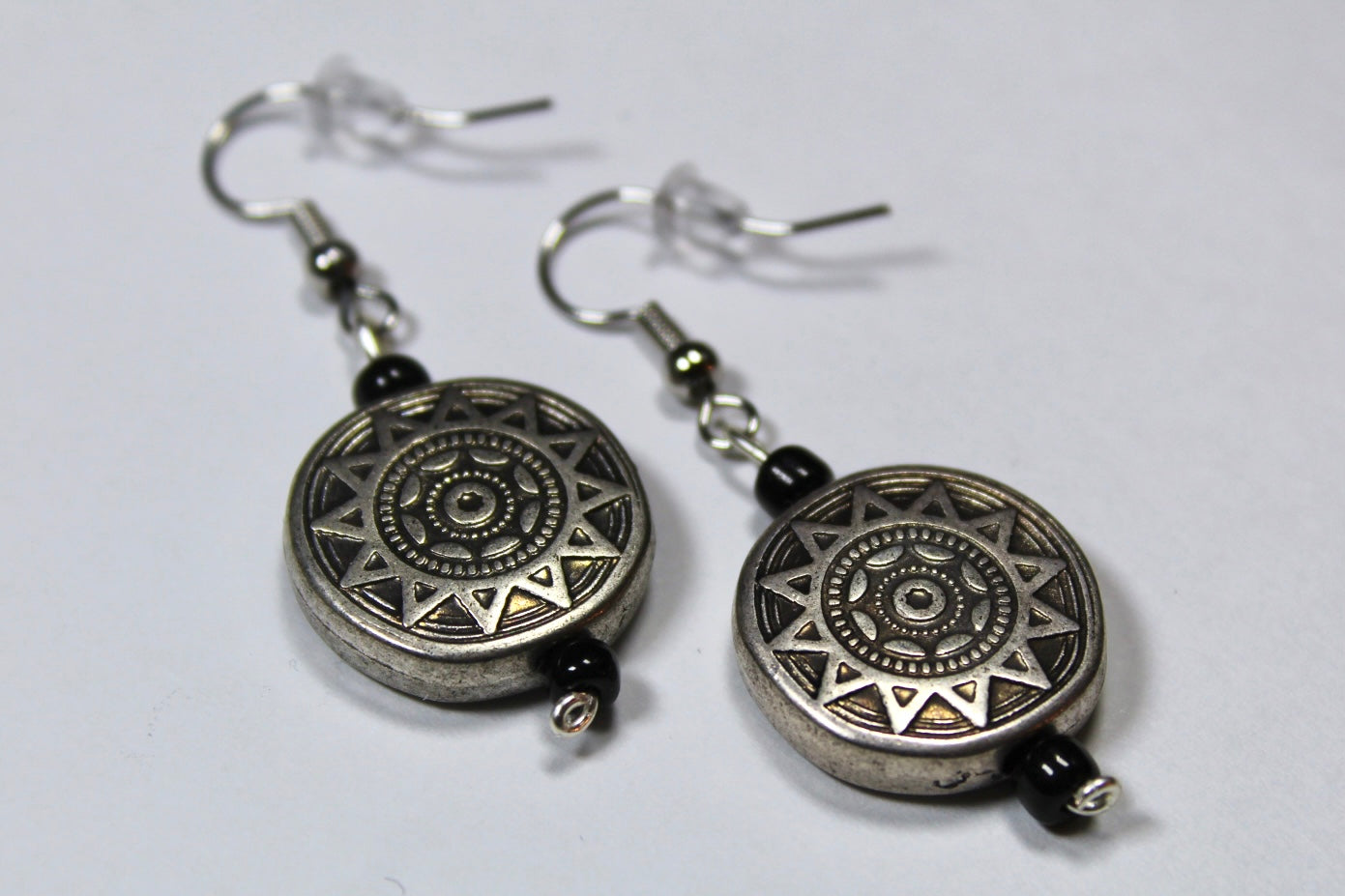 Silver Sun Dangle Earrings With Black Detailing Beads