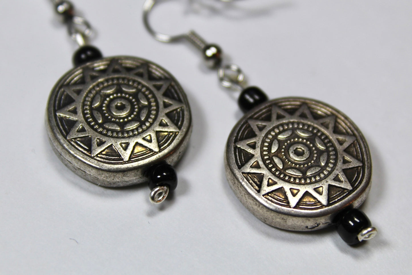 Silver Sun Dangle Earrings With Black Detailing Beads