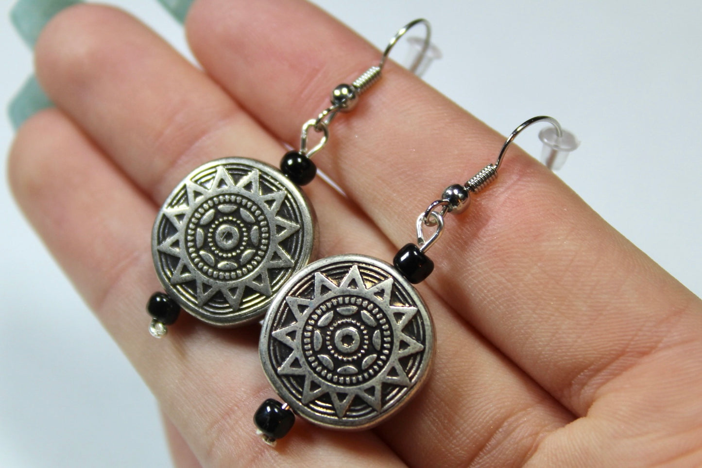 Silver Sun Dangle Earrings With Black Detailing Beads